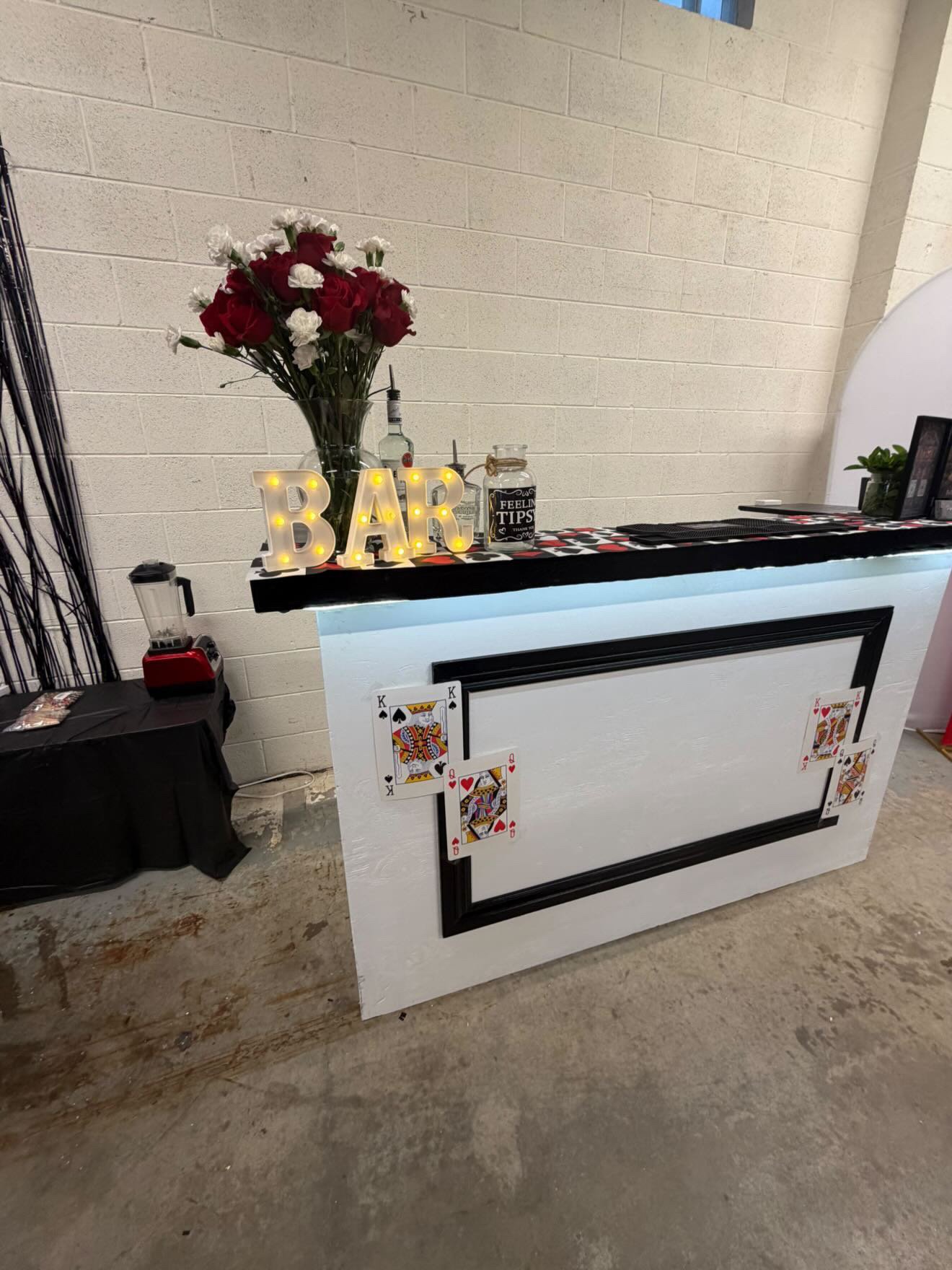 Sips & Shots bar set up for a casino-themed event